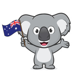 Naklejka premium Koala holding australian flag