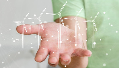 Businessman holding renewable energy sketch