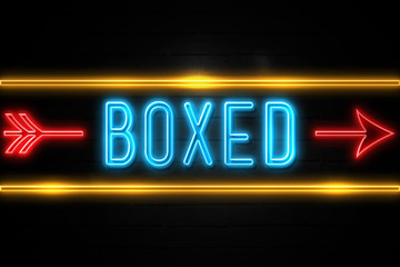 Boxed  - fluorescent Neon Sign on brickwall Front view