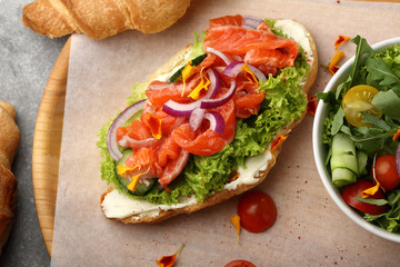 Fresh sandwich with fish and vegetables