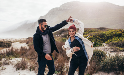 Couple dancing together on trip © Jacob Lund