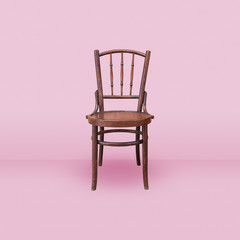 old wood chair on pink room background