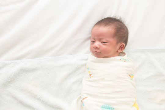 Asian Newborn Baby Yawns,Three Week Old