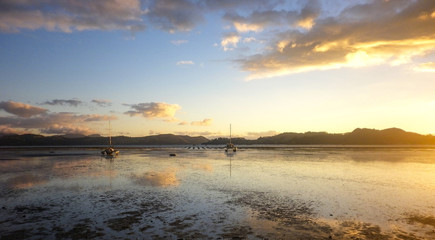 Wonderful sunset at the Natural harbour of the the town of Coromandel, North Island, New Zealand - obrazy, fototapety, plakaty