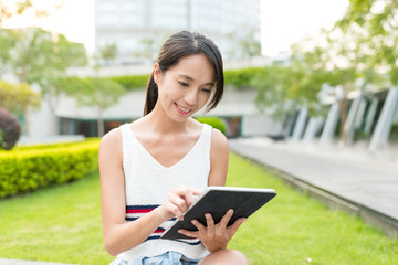 Fototapeta premium Woman working on tablet computer