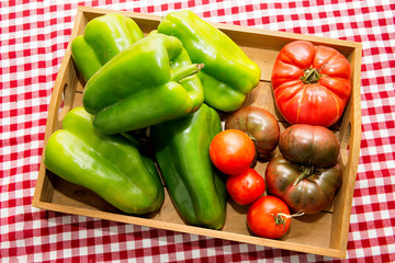 Small wooden crate with vegetables from the garden