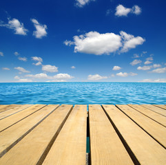 Fototapeta premium Wood and blue sea
