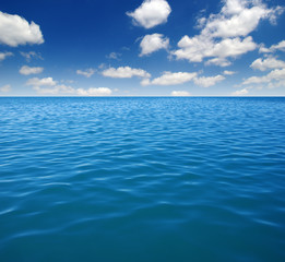 Naklejka na ściany i meble Blue sea water surface