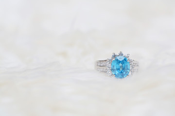 diamond ring and blue gemstone