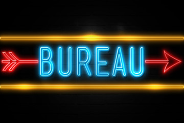 Bureau  - fluorescent Neon Sign on brickwall Front view