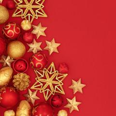 Festive christmas background border on red with bauble decorations. 
