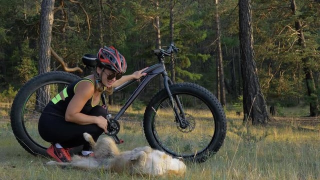 Fat bike also called fatbike or fat-tire bike in summer riding in the forest.