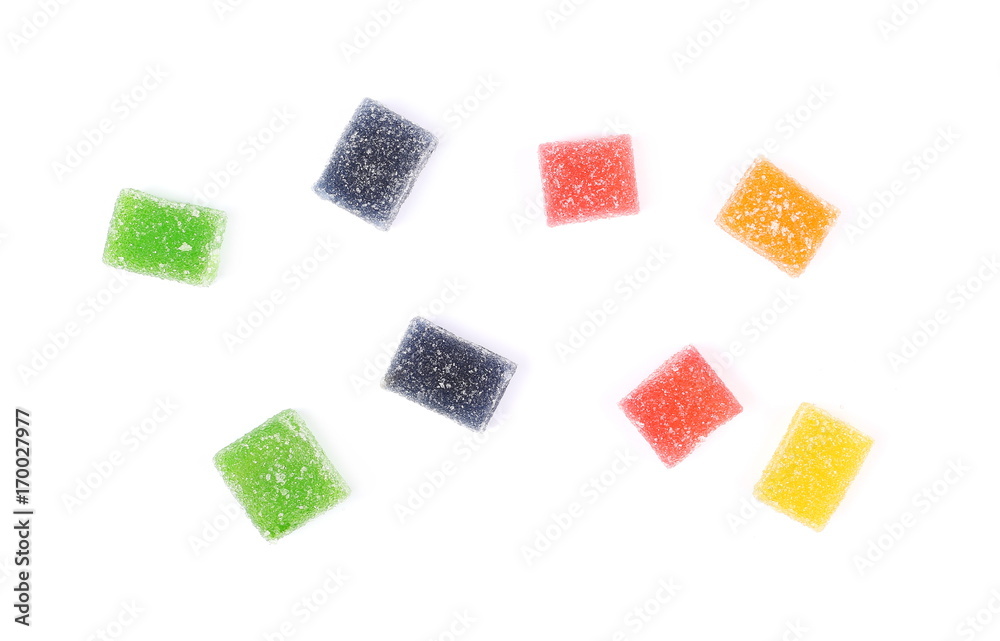 Wall mural colorful jelly sugar candies isolated on white background, top view