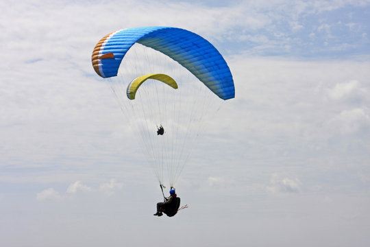 Paragliders flying