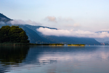 Naklejka na ściany i meble Calm Lake in the Mountains at Dawn