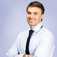 Portrait of business man, over violet background