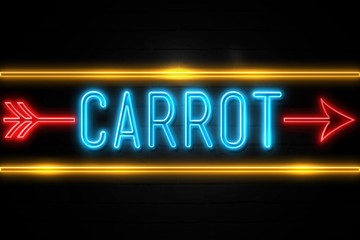 Carrot - fluorescent Neon Sign on brickwall Front view
