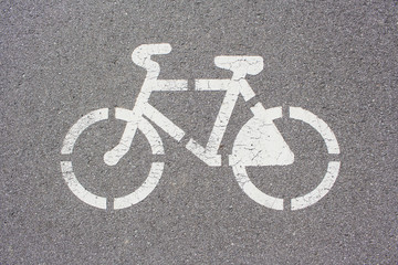 Fototapeta na wymiar Sign bicycle path on asphalt