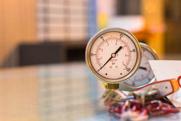 close-up of new set of pressure gauge on glass table preparation maintenance,job industry