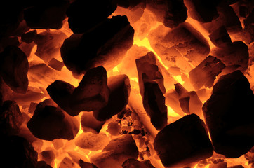 The hot charcoal is like a background.