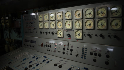 Close up picture of old grey panel for controling a big atomic engine of icebreaker.