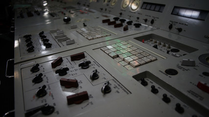 Close up picture of old grey panel for controling a big atomic engine of icebreaker.