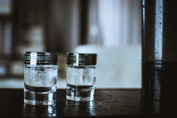 Two stacks of elite alcohol with vodka