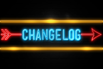 Obraz premium Changelog - fluorescent Neon Sign on brickwall Front view