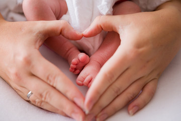 Herzform Hand und Babyfuß