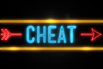 Obraz premium Cheat - fluorescent Neon Sign on brickwall Front view