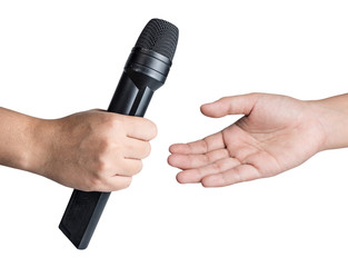 hand holding microphone isolated on white background