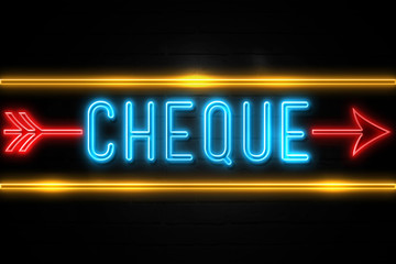 Cheque  - fluorescent Neon Sign on brickwall Front view