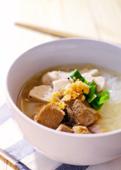 white pork sausage with noodle in soup, asian style
