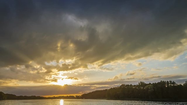 Beautiful sunset over the lake in summer, timelapse, 4K