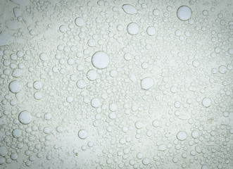 oil drops and water drops on glass,abstract background