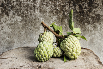 photography still life custard apple fruit on the table.:style image blur.