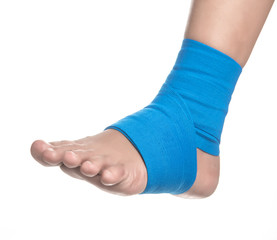 Ankle wrapped in elastic bandage on white background,Ankle pain