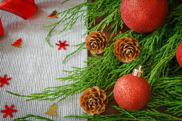 Christmas red balls, fir branches and snowflakes on a white background   Decoration for the holiday new year with 