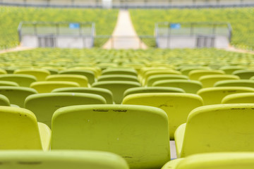 Green stadium chairs with details
