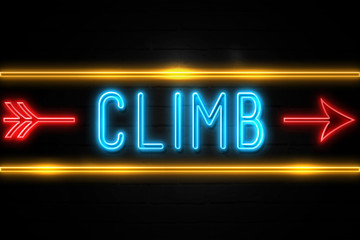 Climbing  - fluorescent Neon Sign on brickwall Front view