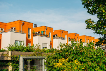 modern townhouses in a row with steel entrance