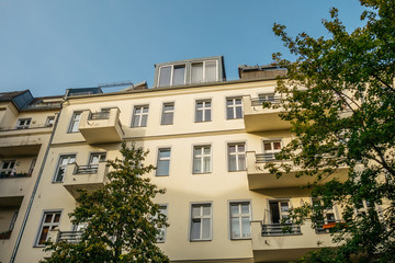 Fototapeta na wymiar yellow apartment building at germany