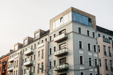 Fototapeta na wymiar apartment building with modern roof