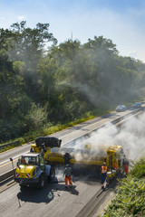 Construction site roadwork, new asphalt layer