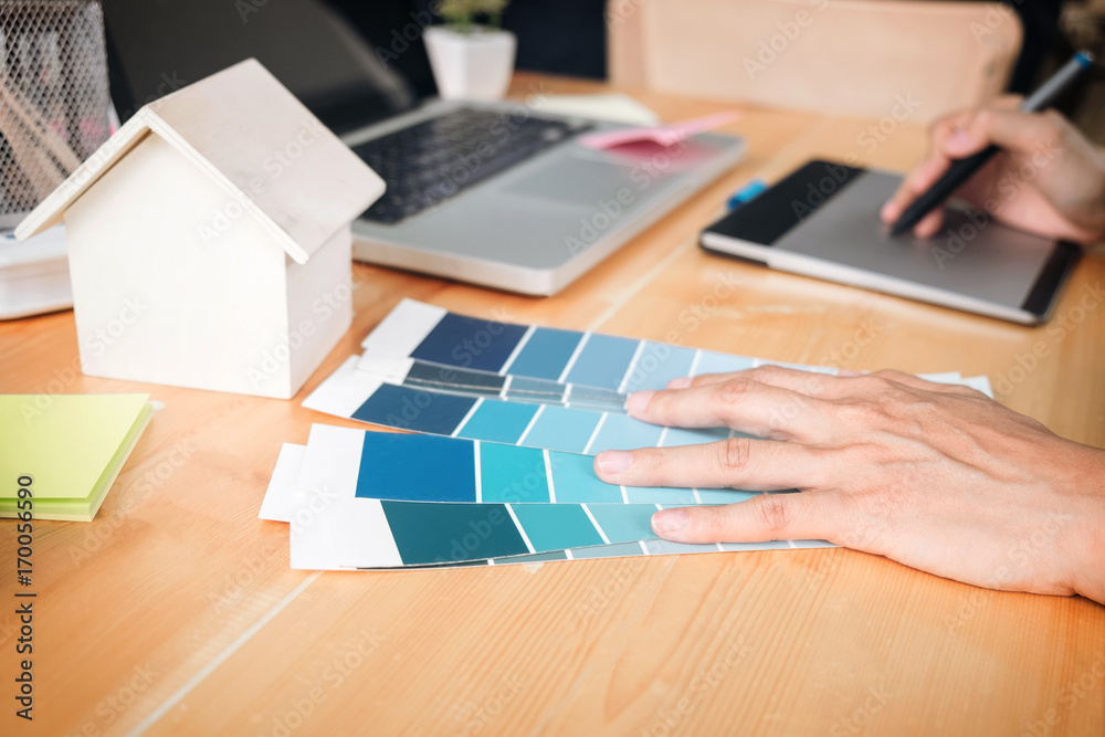 Poster architectural drawing with work tools, graphic designer working with digital drawing tablet and pen 