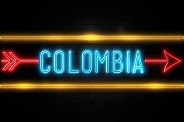 Colombia - fluorescent Neon Sign on brickwall Front view