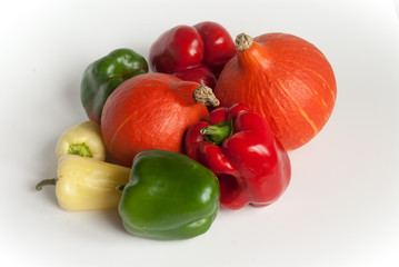 pumpkins and peppers with a white background