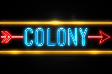 Colony  - fluorescent Neon Sign on brickwall Front view