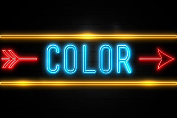 Color  - fluorescent Neon Sign on brickwall Front view