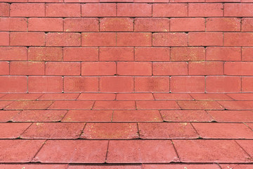 Red brick wall in perspective view, brick pattern textured background.